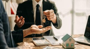 sales-giving-male-customer-signing-sales-contract-asian-woman-and-man-doing-business-in-office-business-concept-and-contract-signing-photo